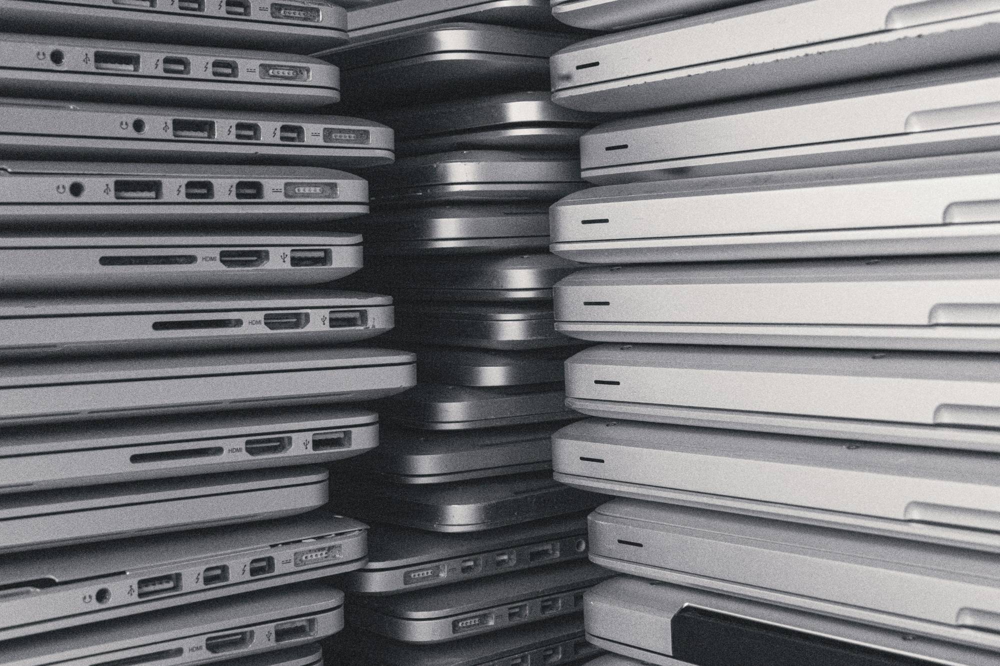 Stacks of laptops viewed from the side